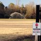 A sprayer soaks a field with liquefied manure and urine from a large-scale hog farm in Duplin County, North Carolina.
